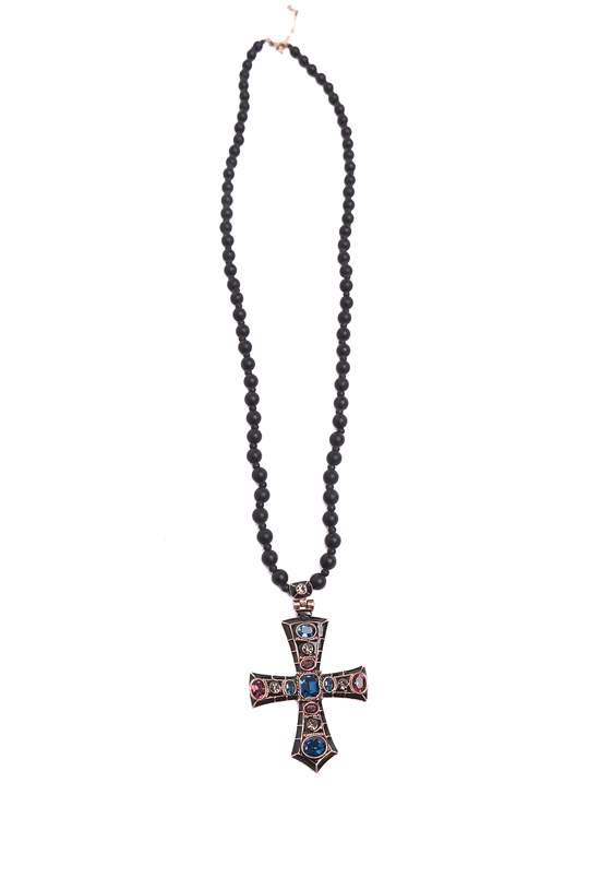 A Necklace with a cross unfolding 
